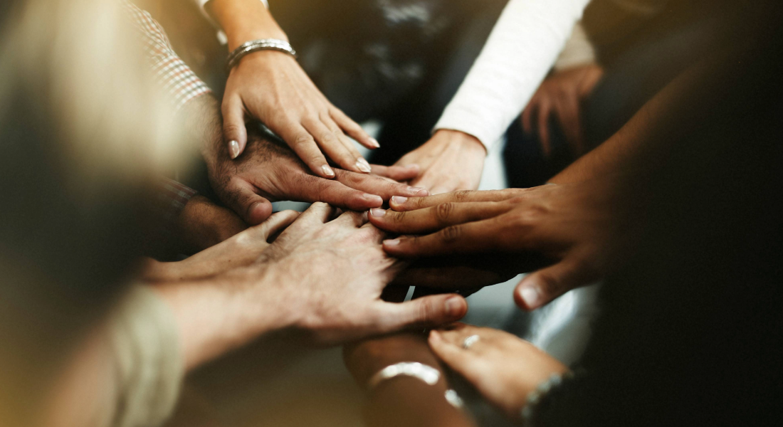 Close up of hands together